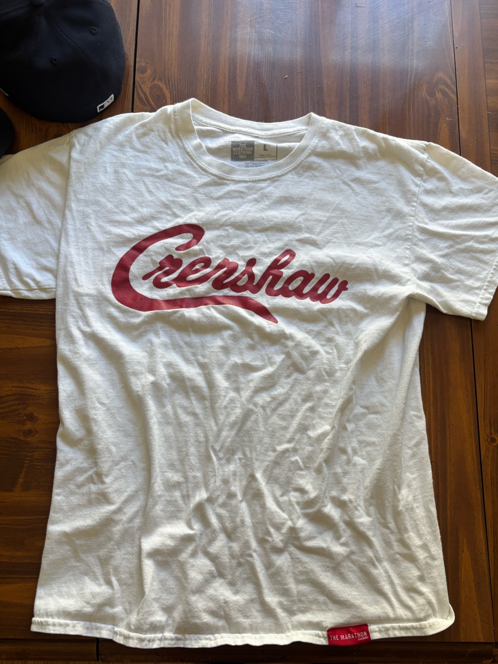 The Marathon Clothing White T-Shirt with Red "Crenshaw" Script